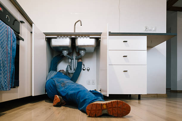 Professional Drain Cleaning technician working in Newbury, NH